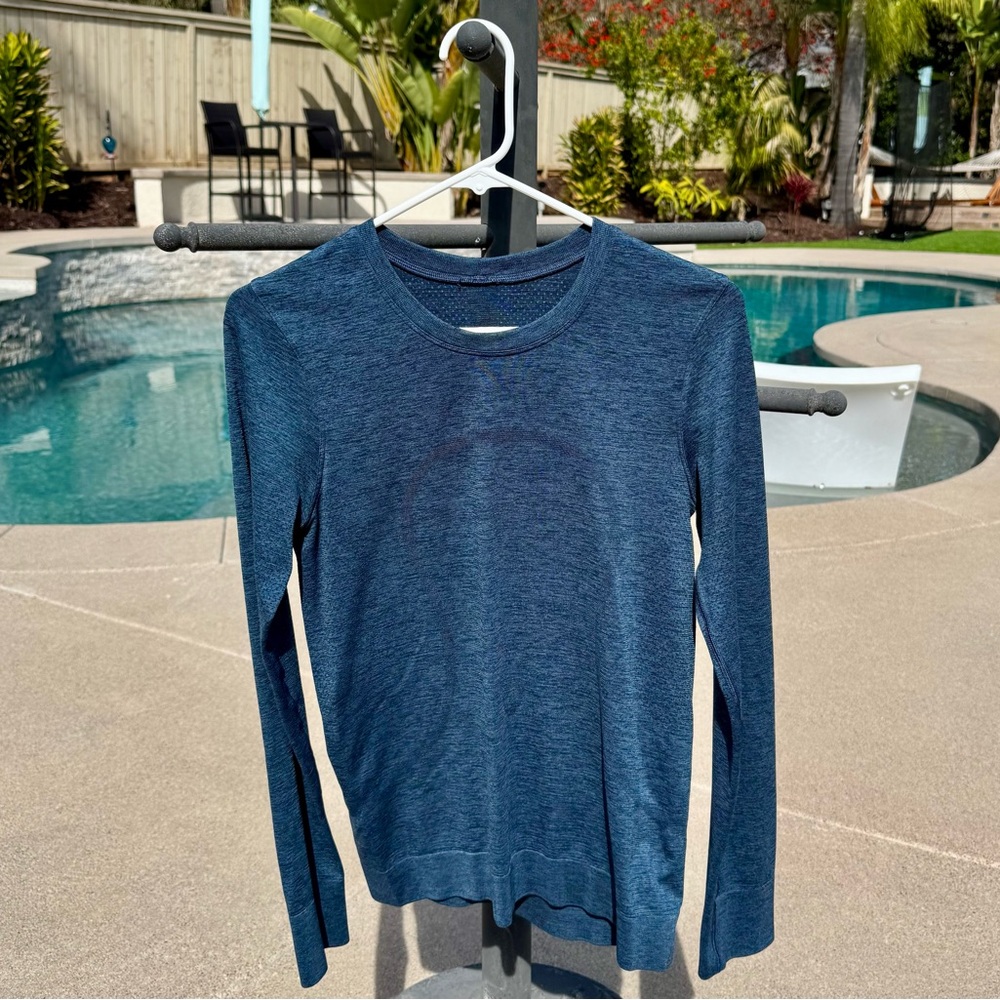 LuLuLemon Swiftly relaxed fit teal/blue long sleeve hip length shirt
